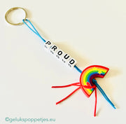 Proud keychain with lucky rainbow doll