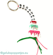 Sleutelhanger bedankt met gelukspoppetje taartje