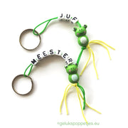 Keyring master with lucky frog doll