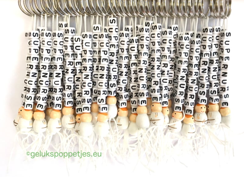 Supernurse keychain with lucky nurse doll