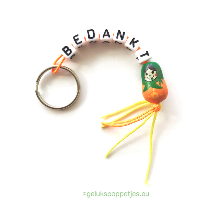 Thank you keychain with lucky matryoshka doll