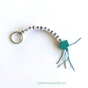 Sleutelhanger superbroeder met gelukspoppetje kroontje