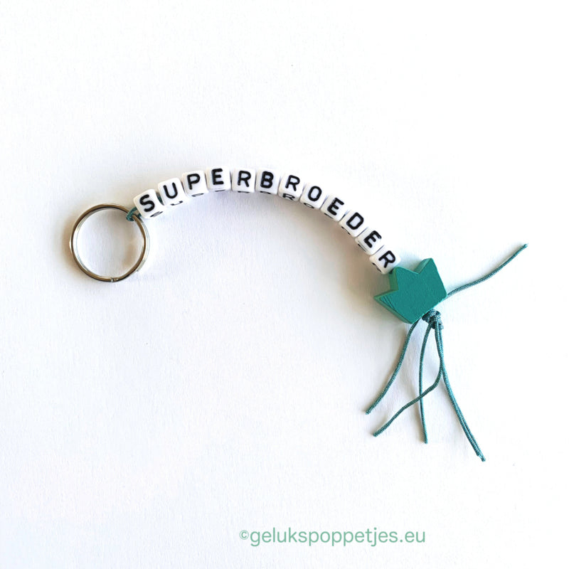 Keychain super brother with lucky charm crown