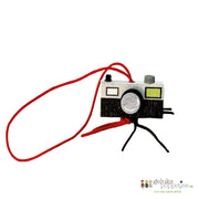 Gelukspoppetje camera