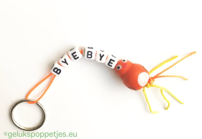 Sleutelhanger bye bye met gelukspoppetje vogel