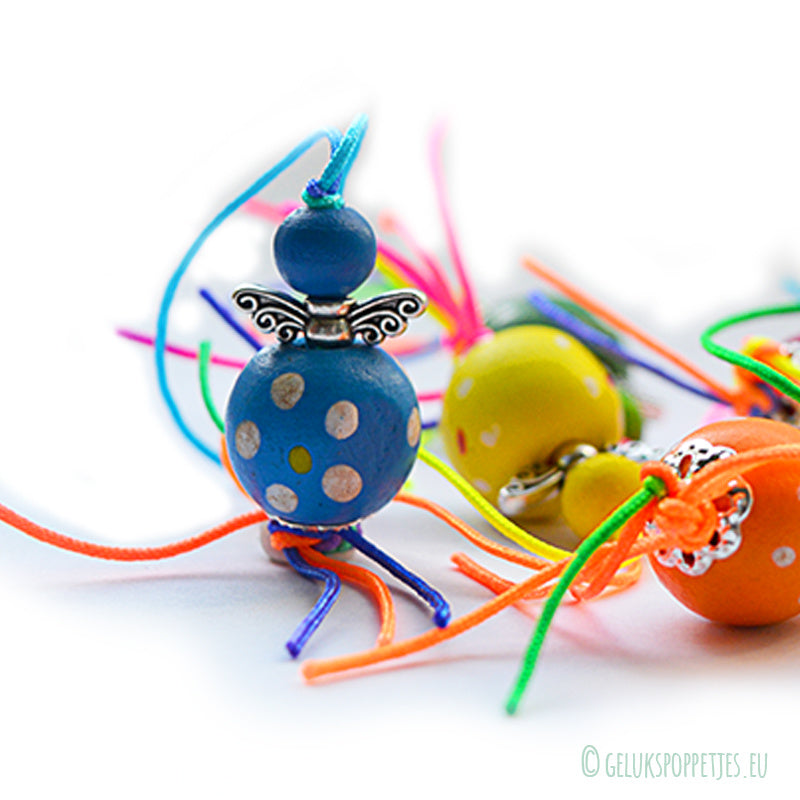 lucky doll colored angel with dots