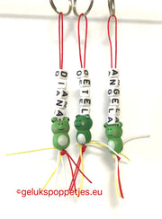 Keyring oetel with lucky frog doll and oetel strings