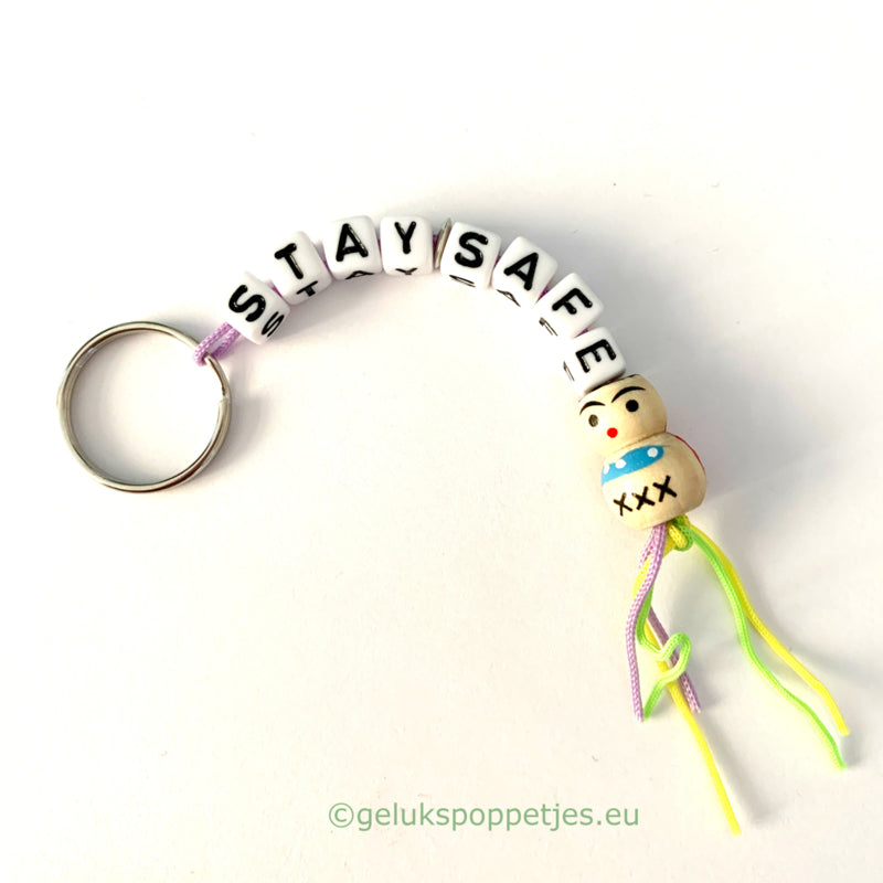Stay safe keychain with wooden lucky charm