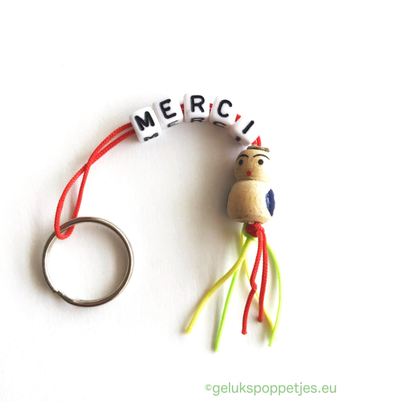 Merci keychain with wooden lucky charm