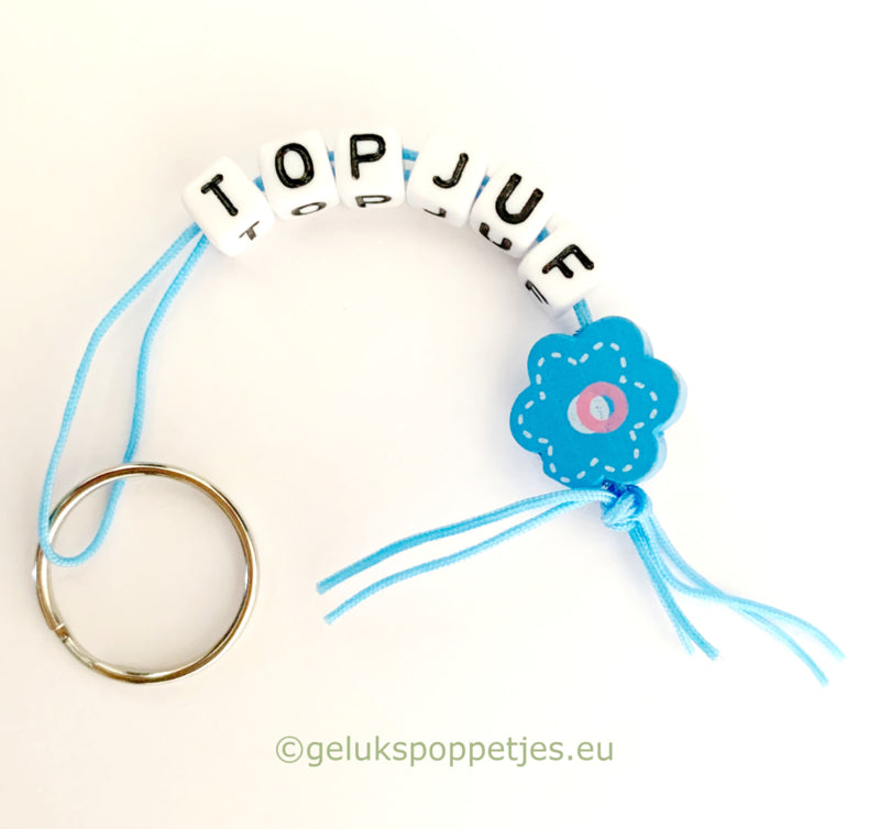 Sleutelhanger met bedankt en gelukspoppetje vergeet-me-nietje
