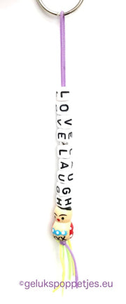 Love-laugh keychain with wooden lucky charm