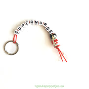 Supernurse keychain with lucky nurse doll