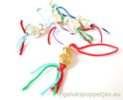 Gelukspoppetje verguld