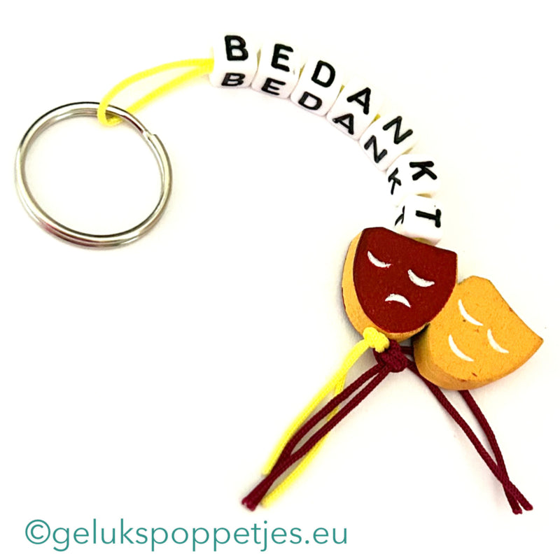 Bedankt sleutelhanger met gelukspoppetje theatre masker
