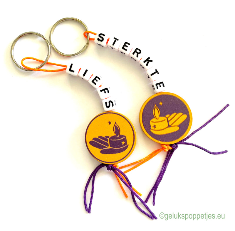 Keychain sweet with lucky charm and light point