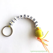 Lucky bird keychain with lucky bird figure