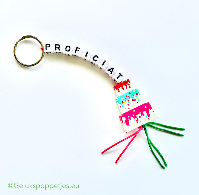 Sleutelhanger proficiat met gelukspoppetje taartje